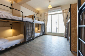 Отель Sleeping Boot Hostel  Хуален
